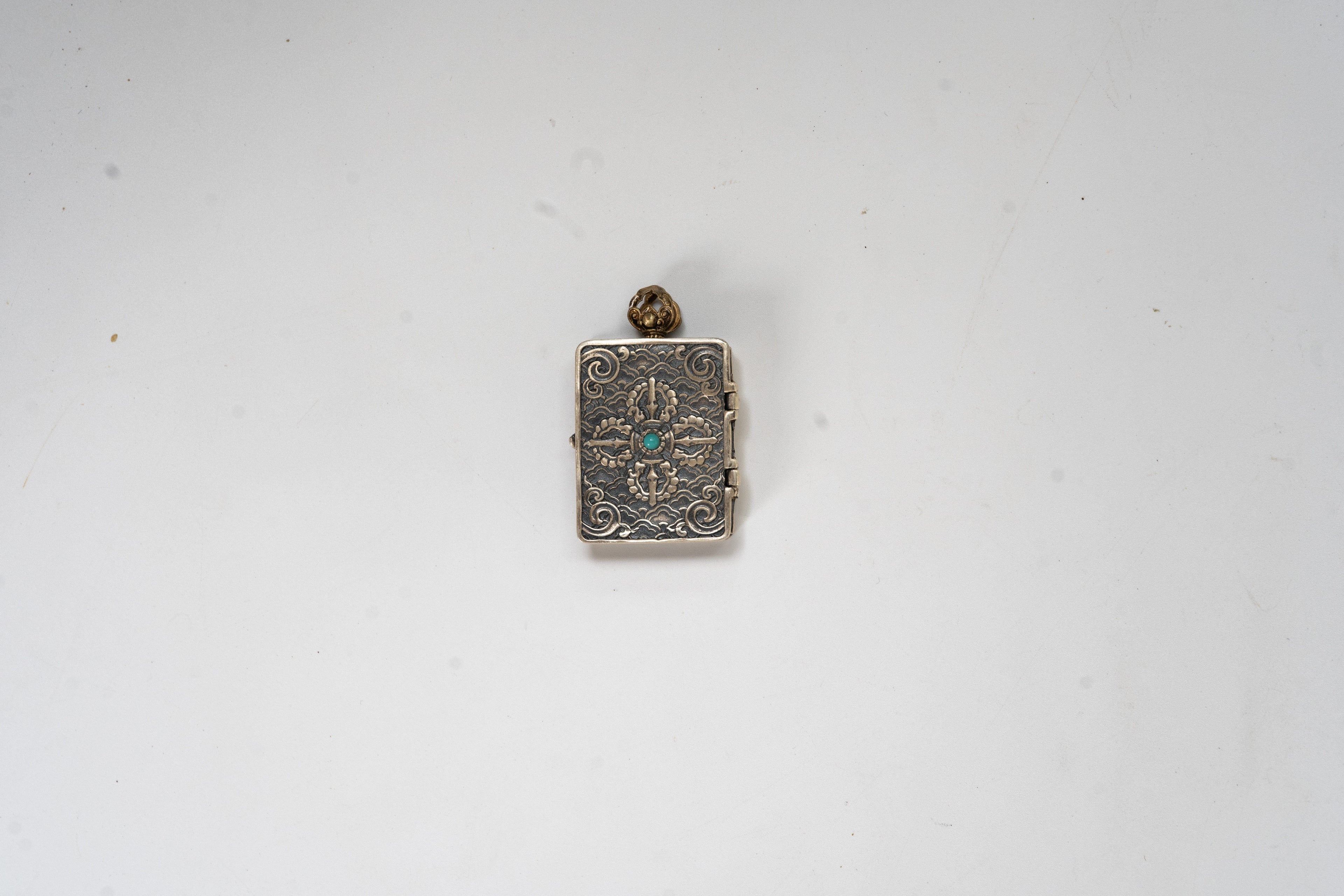 Tibetan Silver Scripture Pendant · Openable Yellow Jambhala Blessing